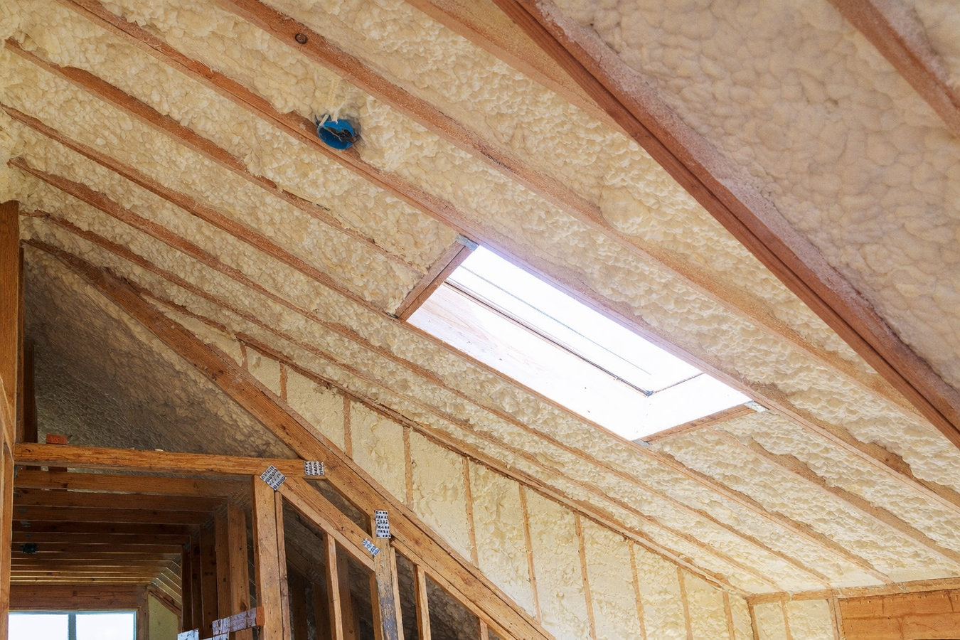 Insulation contractor working in a South Burlington, VT home