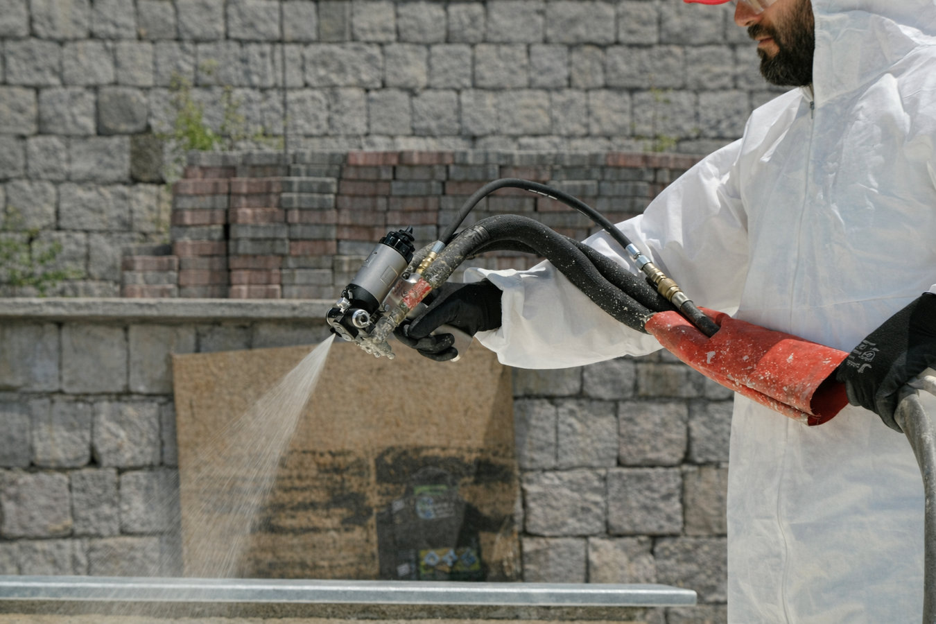 Spray foam insulation being applied in a South Burlington home